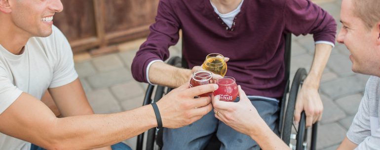 wheelchair drinks friends