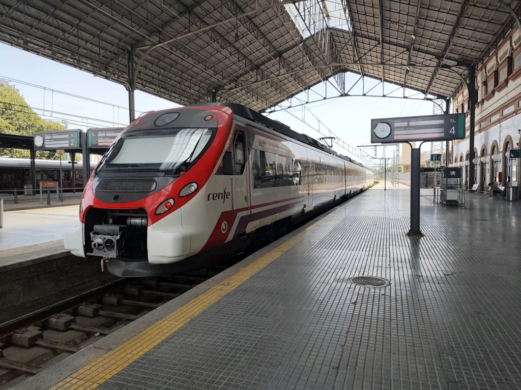Renfe commuter train at Barcelona train station platform