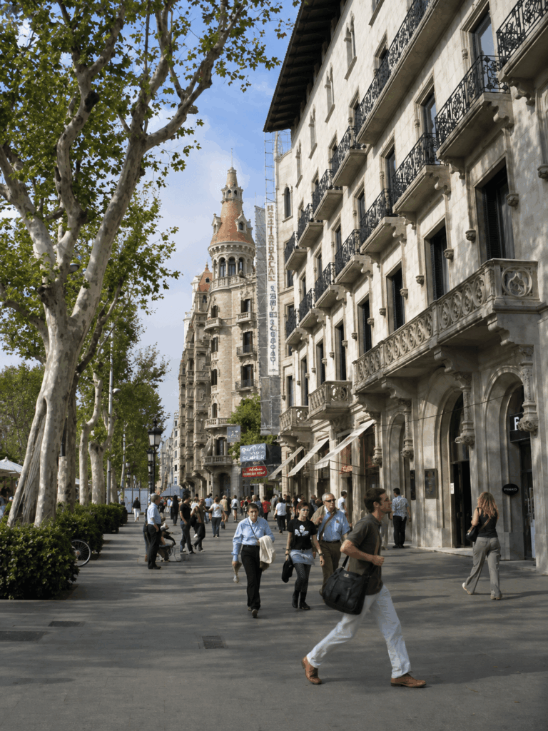 People walking and shopping on Passeig de Gràcia.