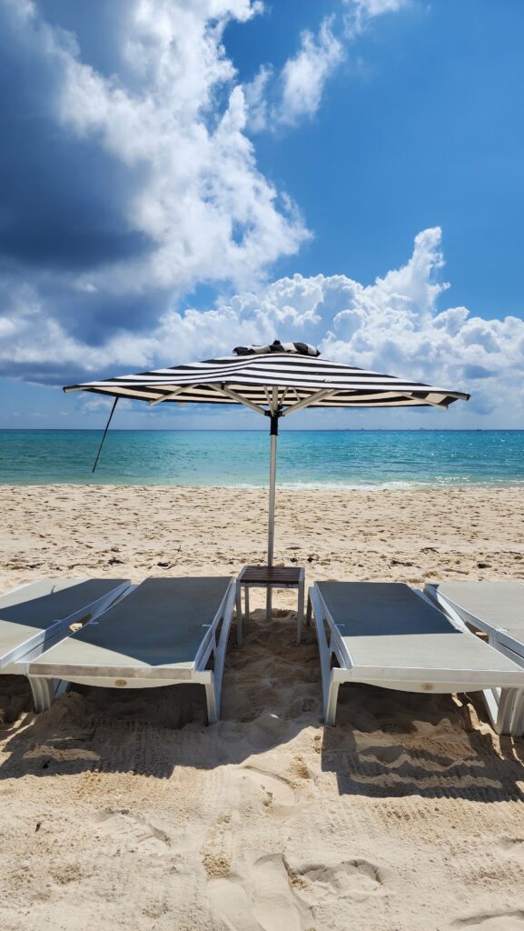 sun loungers with parasol on the beach 
