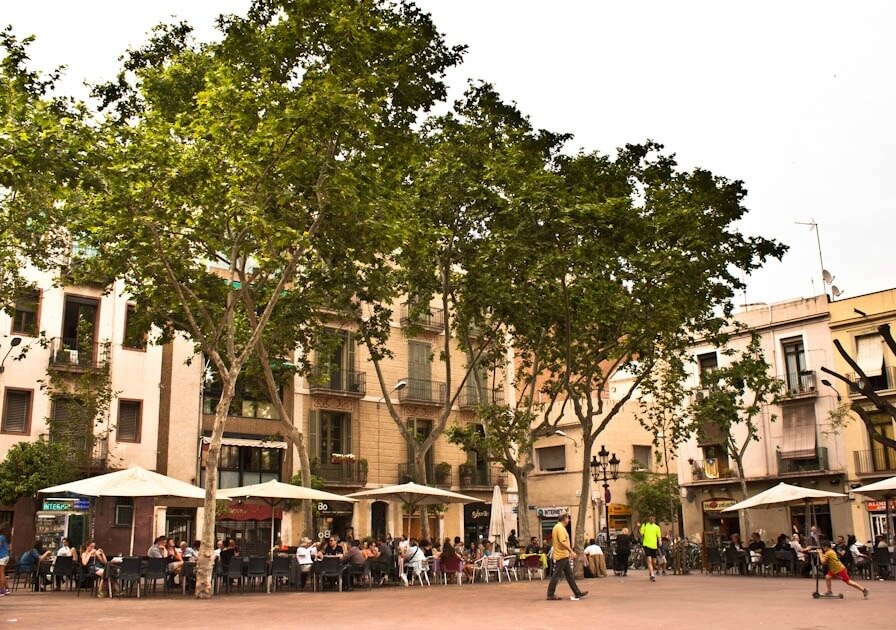 Plaza de la Vila de Gràcia with cafes and restaurants