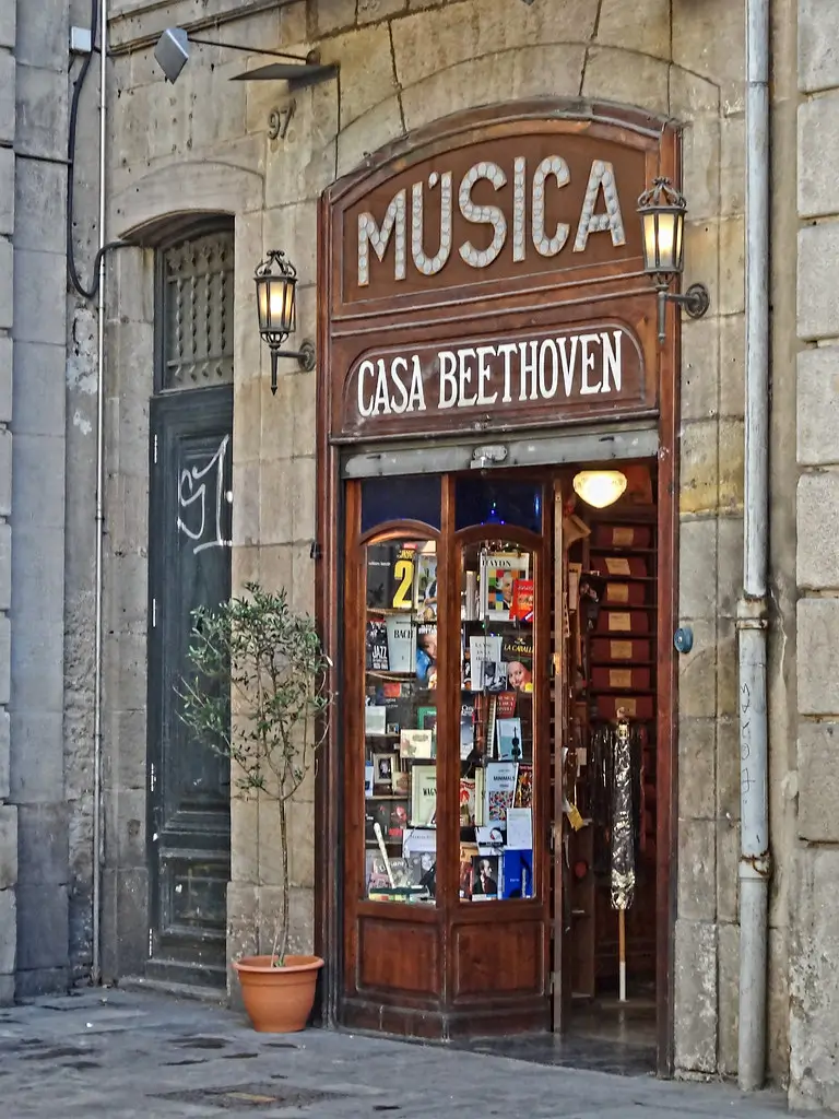 Historic Casa Beethoven music shop in Barcelona with its traditional wooden storefront and sheet music on display.