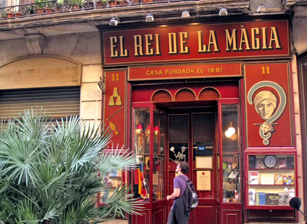 Historic El Rei de la Màgia magic shop in Barcelona, founded in 1881, with its distinctive red storefront.